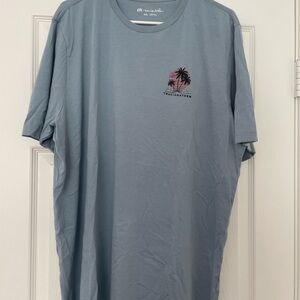 light blue men's top, gently used, brand travis mathew, size XXL